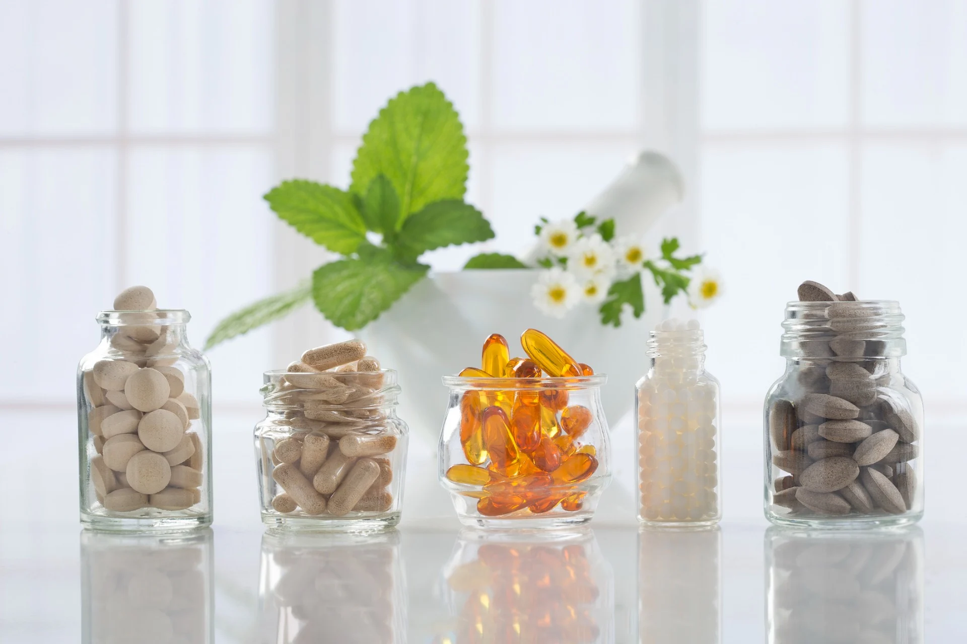 best supplements to take colorful vitamins lined up